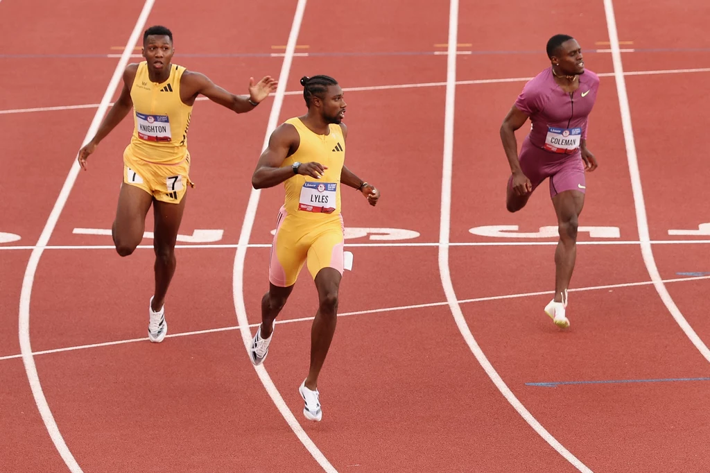 Noah Lyles (w środku) na mecie finałowego biegu na 200 m Noah Lyles (w środku) na mecie finałowego biegu na 200 m