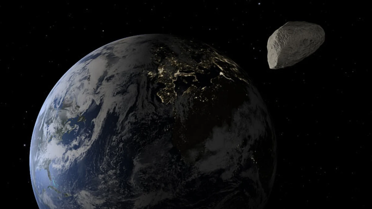 Wizja artystyczna asteroidy Apophis w pobliżu Ziemi. Wizja artystyczna asteroidy Apophis w pobliżu Ziemi.