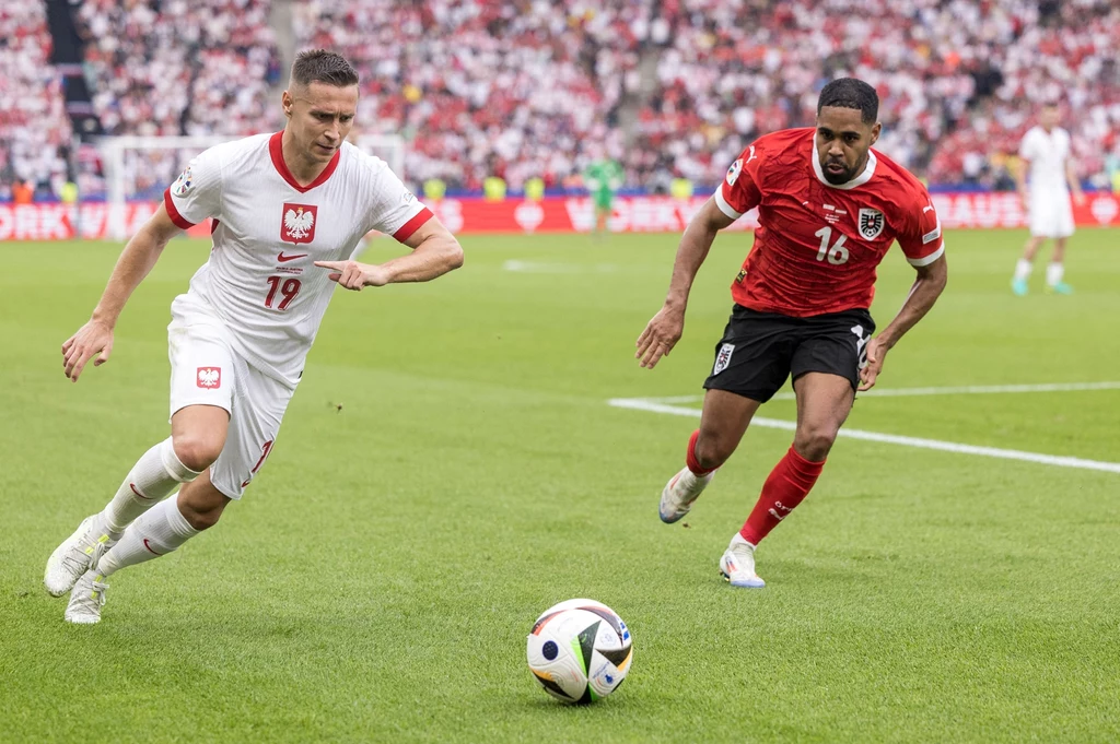 Przemysław Frankowski i Philipp Mwene w meczu Polska - Austria Przemysław Frankowski i Philipp Mwene w meczu Polska - Austria