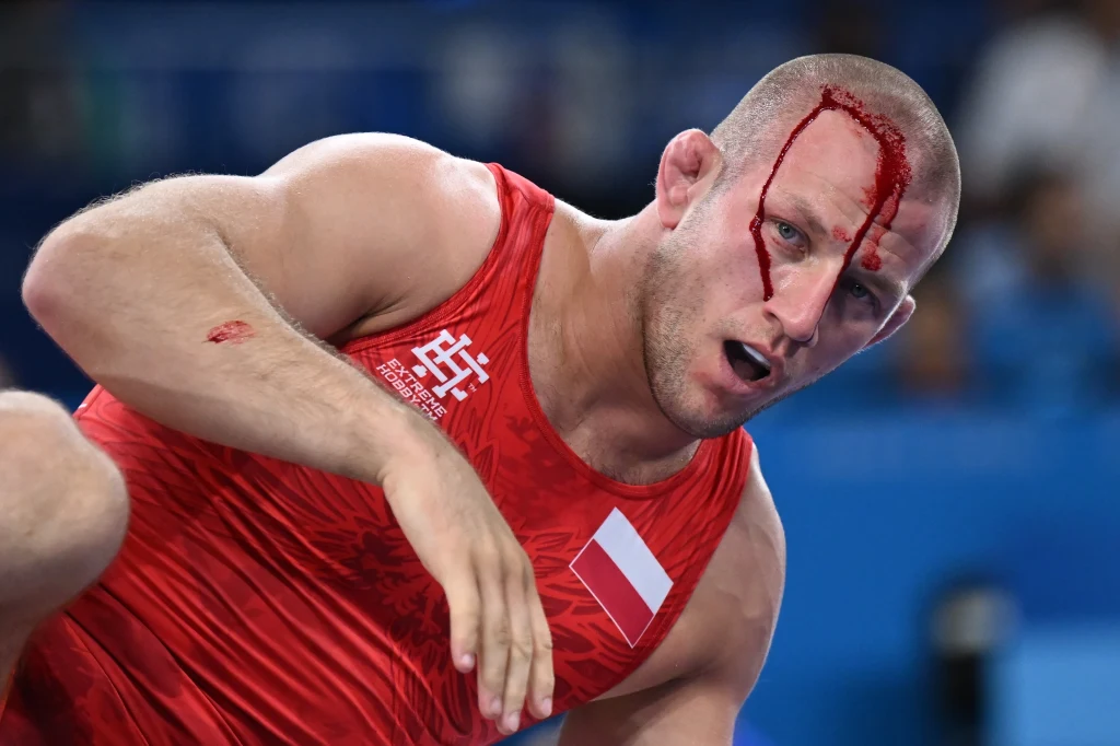 Arkadiusz Kułynycz (na zdj.) w pojedynku o brązowy medal w stylu klasycznym w kategorii 87 kg z Żanem Beleniukiem z Ukrainy