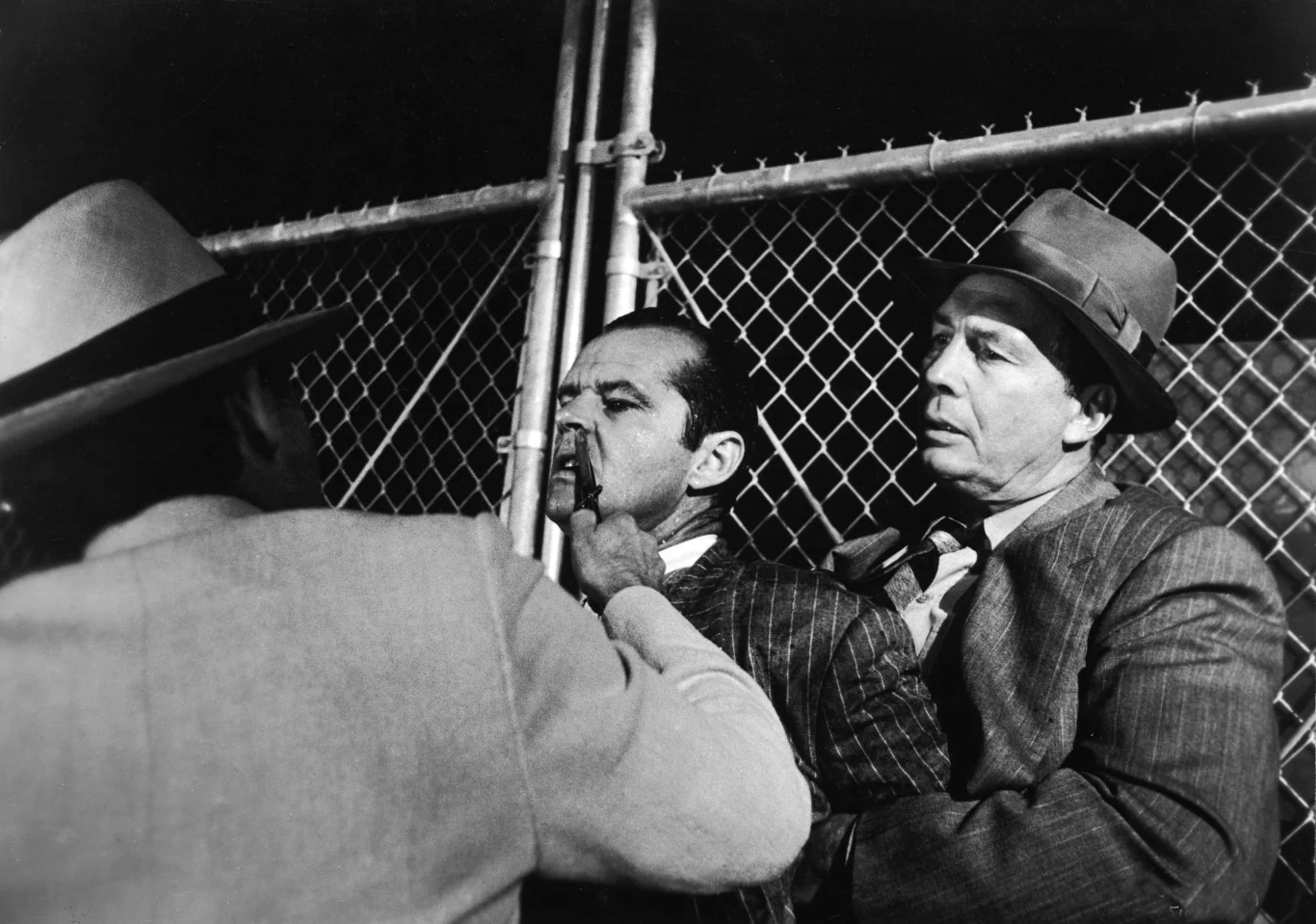 Kadr z filmu Jack Nicholson i Roman Polański w scenie z nożem Kadr z filmu Jack Nicholson i Roman Polański w scenie z nożem