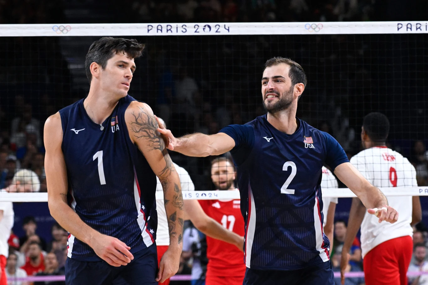 Aaron Russell (z numerem 2) w barwach reprezentacji Stanów Zjednoczonych. Obok Matthew Anderson