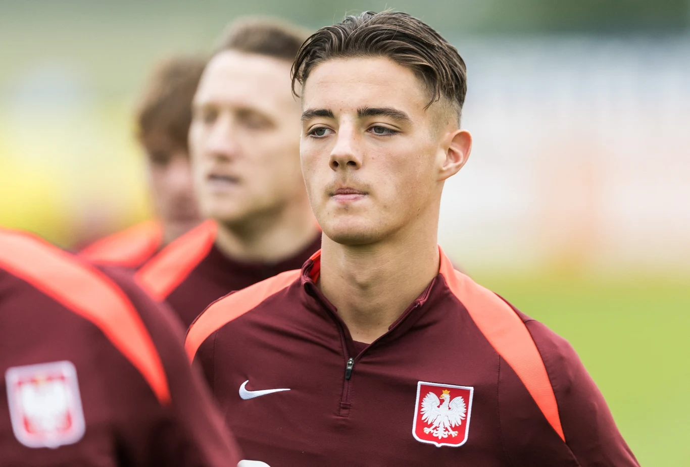 Kacper Urbański, w tle Piotr Zieliński