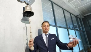 Prezes ML System Dawid Cycoń podczas uroczystego debiutu spółki na GPW