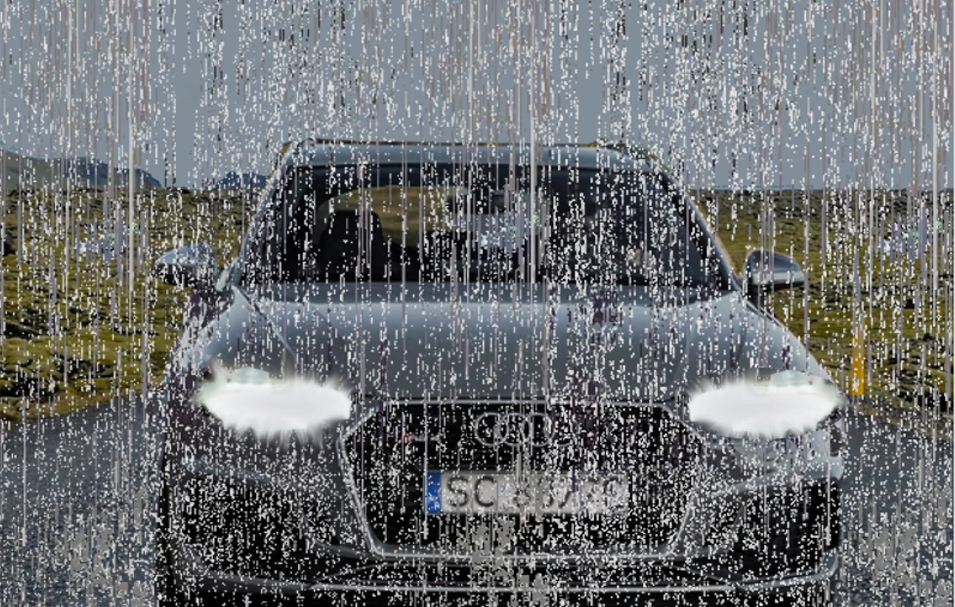 Samochód z zapalonymi światłami mijania