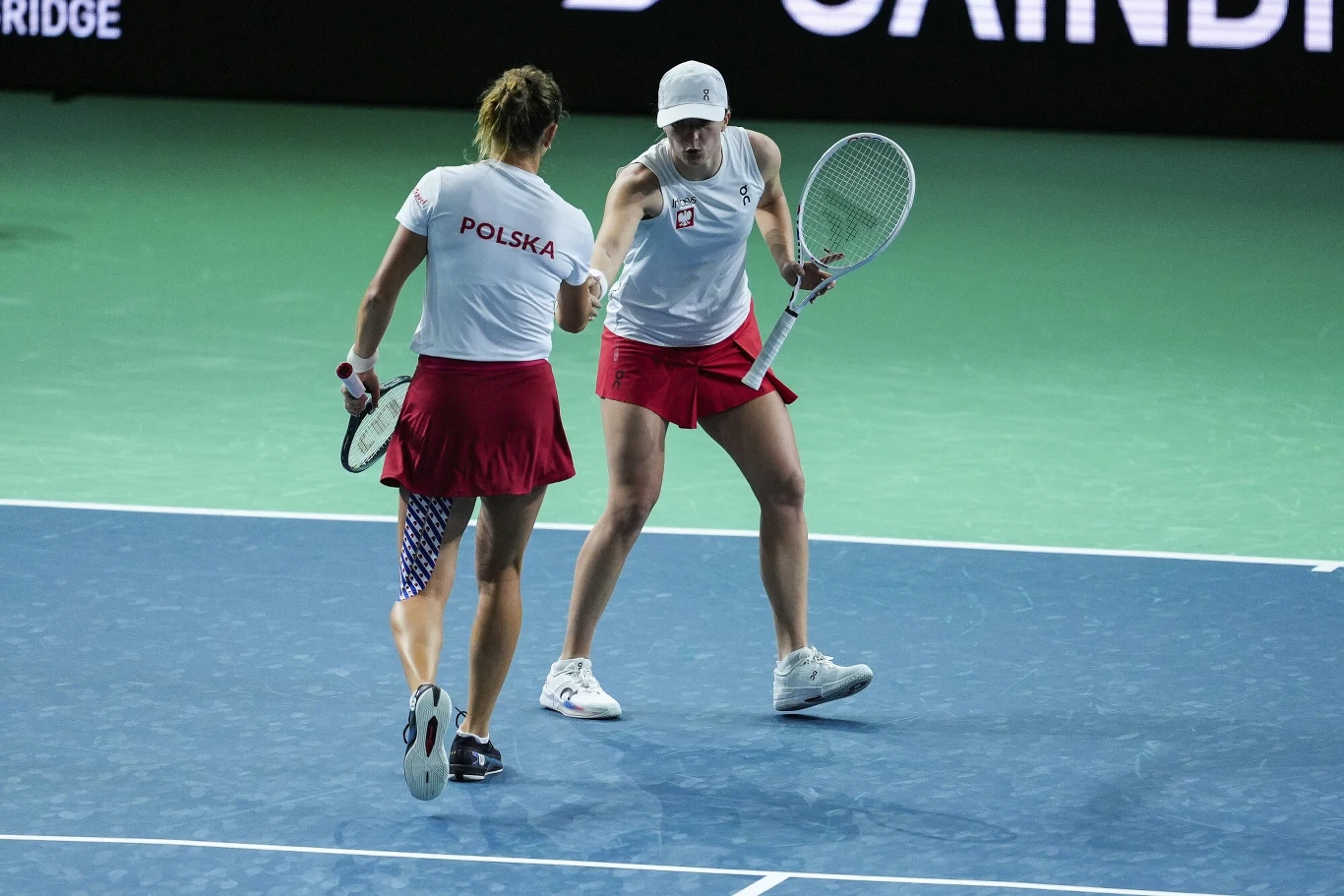 Reprezentacja Polski w finałach Billie Jean King Cup. Na zdjęciu Iga Świątek i Katarzyna Kawa