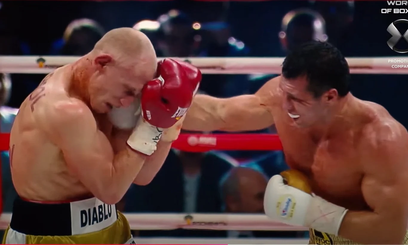 Krzysztof "Diablo" Włodarczyk (z lewej) w starciu z Grigorijem Drozdem w 2014 roku