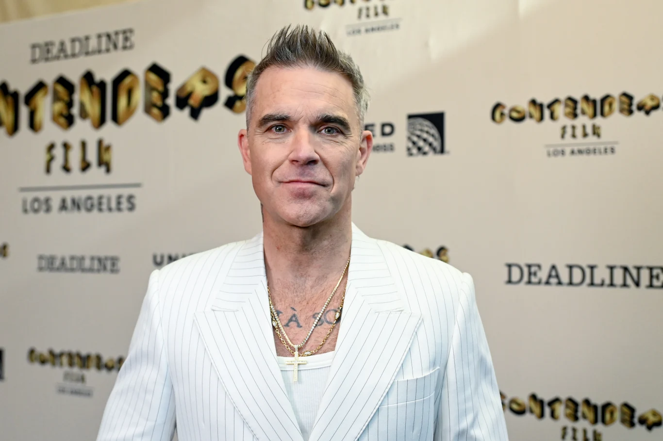 Robbie Williams na początku swojej kariery śpiewał w popularnym boysbandzie Robbie Williams na początku swojej kariery śpiewał w popularnym boysbandzie
