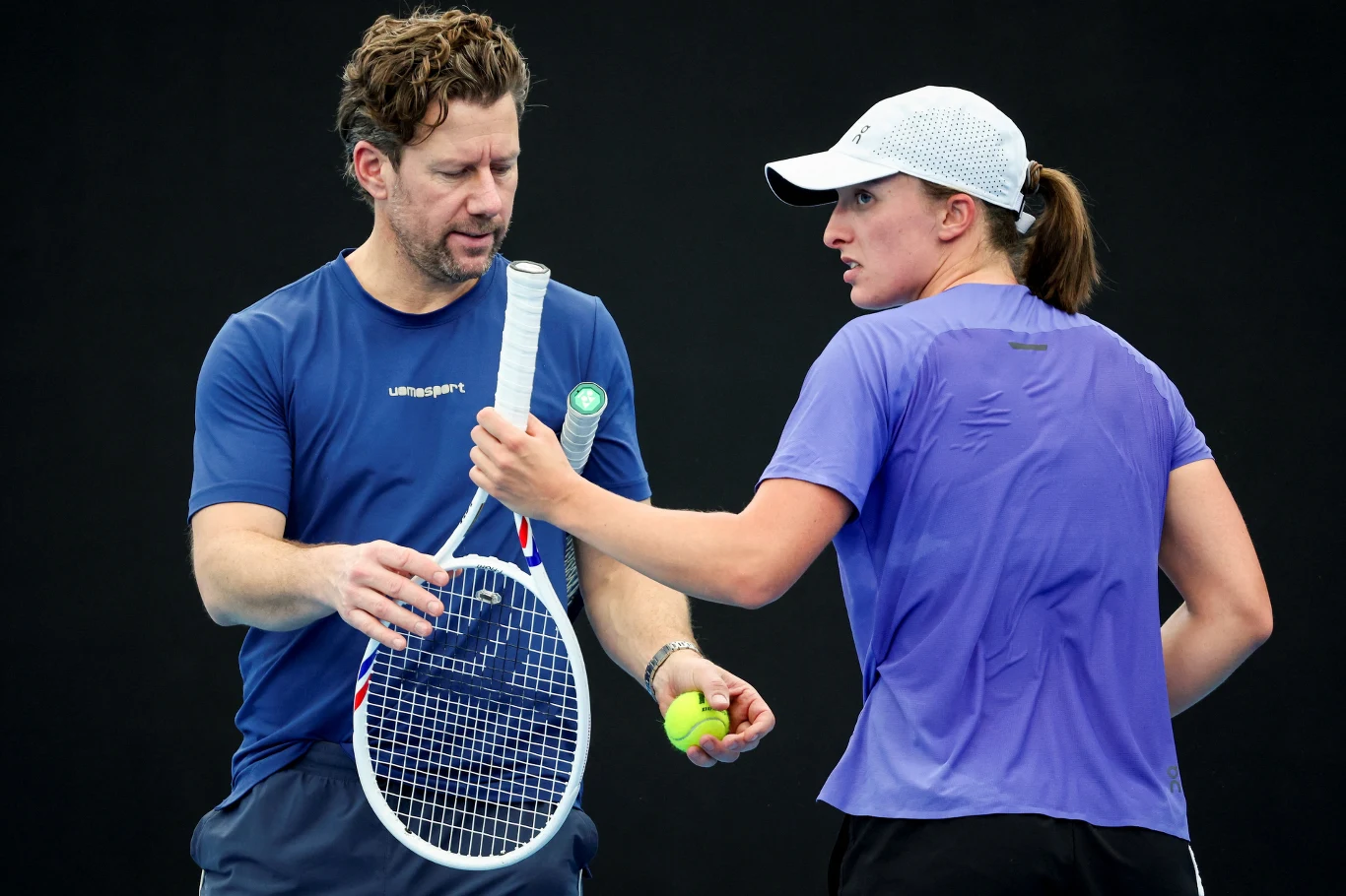 Na zdjęciu trener Wim Fissette oraz Iga Świątek