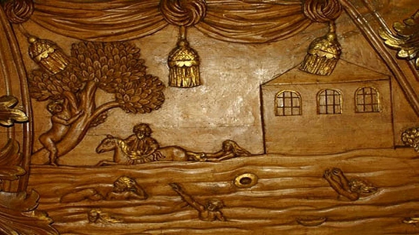 Scena powodzi w Darłowie na ambonie w kościele NMP