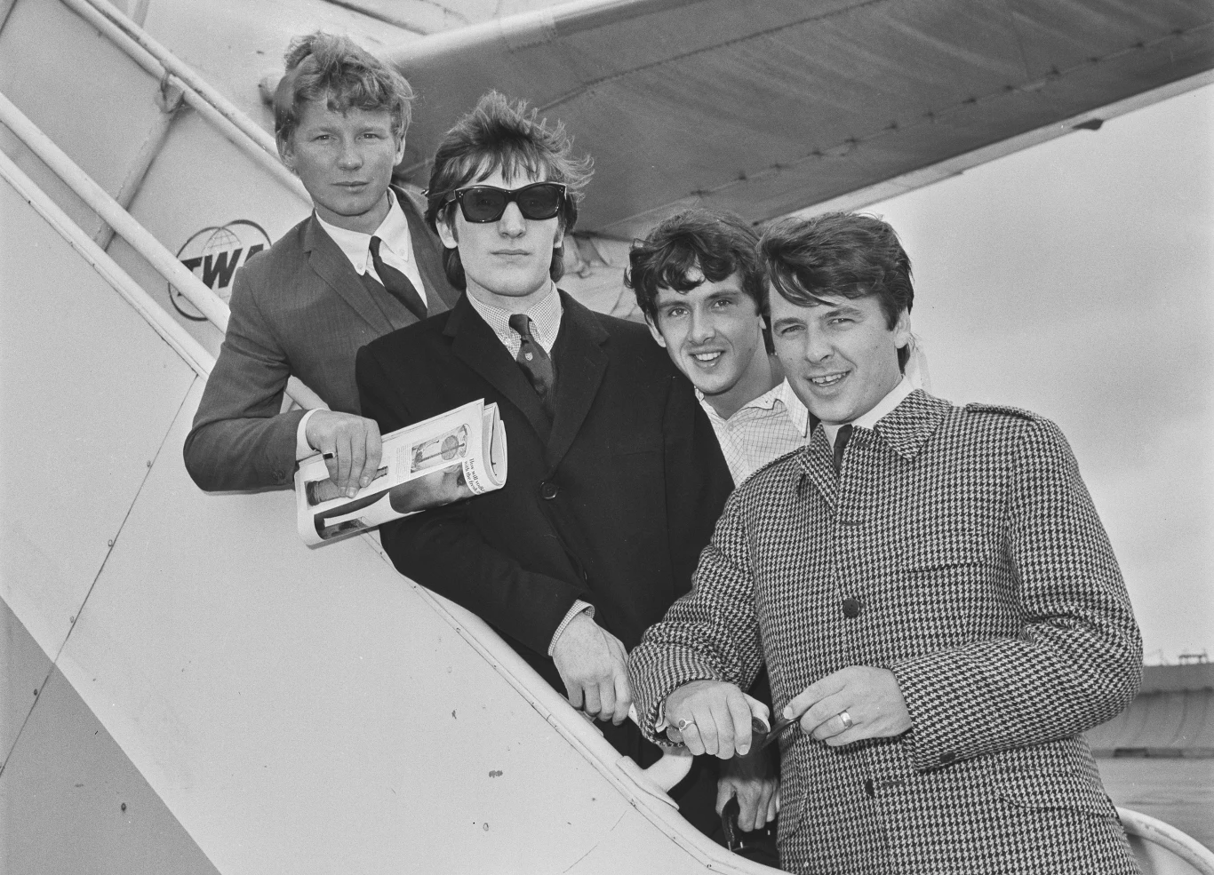 The Searchers w 1964 r. - od lewej: John McNally, Chris Curtis, Frank Allen i Mike Pender The Searchers w 1964 r. - od lewej: John McNally, Chris Curtis, Frank Allen i Mike Pender