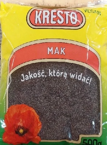Opakowanie maku firmy KRESTO, o pojemności 500 g, w jasnych kolorach czerwieni i żółci, z widocznym logo oraz napisem 'Jakość, którą widać!'. Na dole opakowania ilustracja maku kwitnącego.