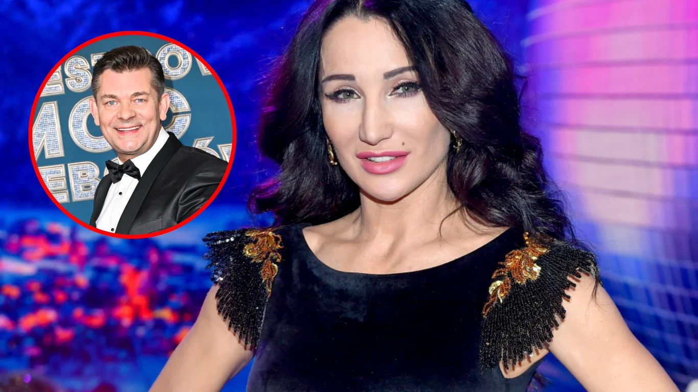 Zenon Martyniuk zwrócił się do Justyny Steczkowskiej Kobieta w eleganckiej czarnej sukni z ozdobnymi elementami na ramionach stoi na tle kolorowej, rozmytej scenografii. W lewym górnym rogu widoczny jest wstawiony okrągły portret mężczyzny w garniturze.