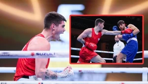 Jakub Straszewski (czerwony) w pojedynku kategorii 85 kg z Brytyjczykiem Teagnem Stottem zapewnił sobie miejsce w finale