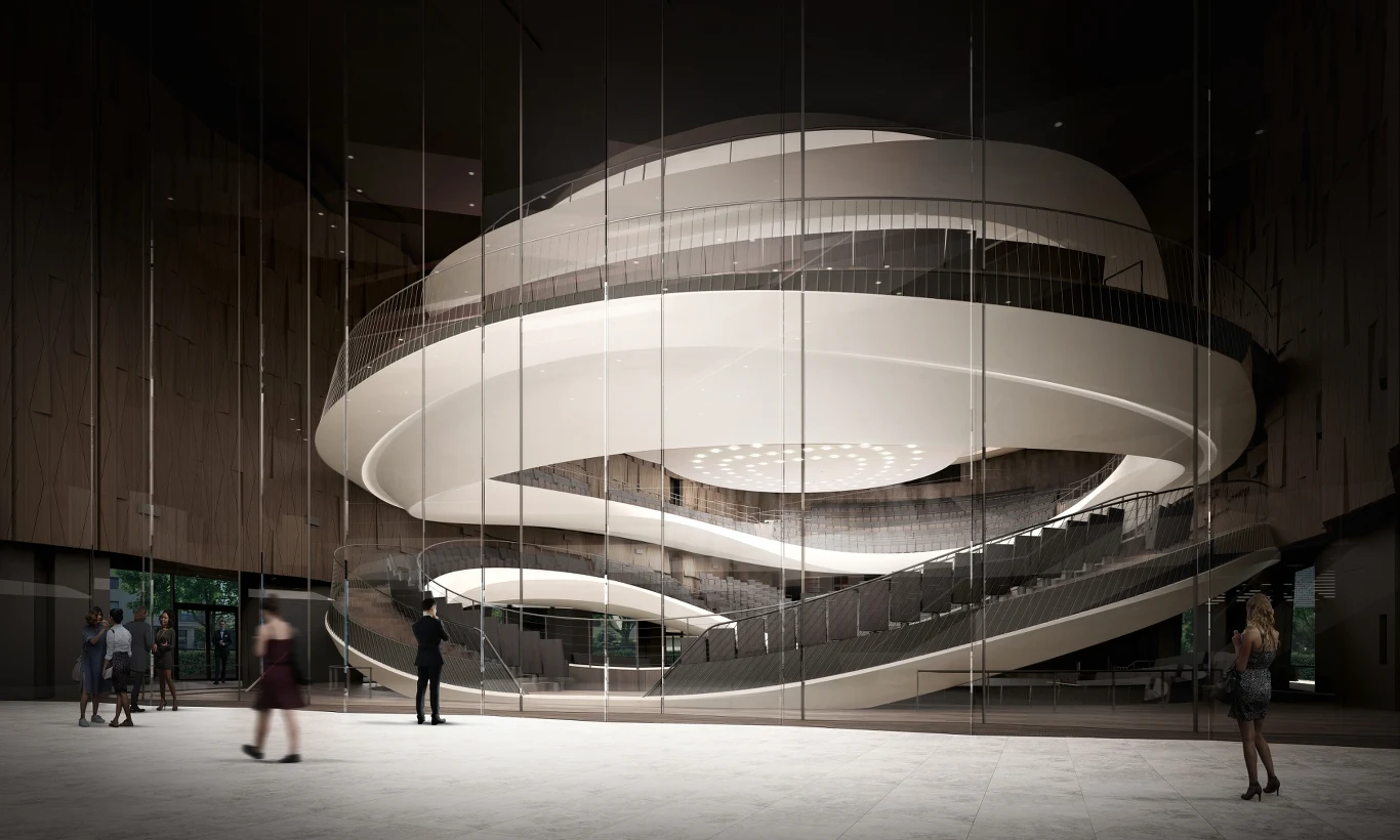 Futurystyczne wnętrze budynku z monumentalną, spiralną konstrukcją schodów. Ludzie stoją wokół, a całość otacza przeszklona ściana, dająca poczucie przestronności i nowoczesności.