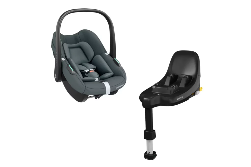 Fotelik samochodowy dla niemowląt z ergonomicznym wkładem oraz oddzielna baza montażowa z mocowaniem ISOFIX, zestaw przeznaczony do bezpiecznego przewożenia dzieci w samochodzie.