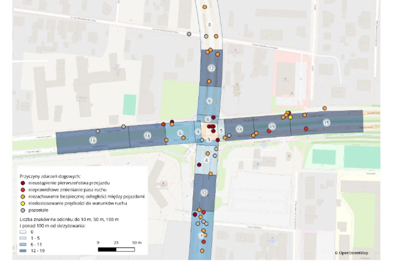 Mapa skrzyżowania z zaznaczonymi miejscami kolizji drogowych, kolorowe kropki informują o przyczynach zdarzeń, a obszary w różnych odcieniach pokazują liczbę wypadków w zależności od odległości od skrzyżowania.