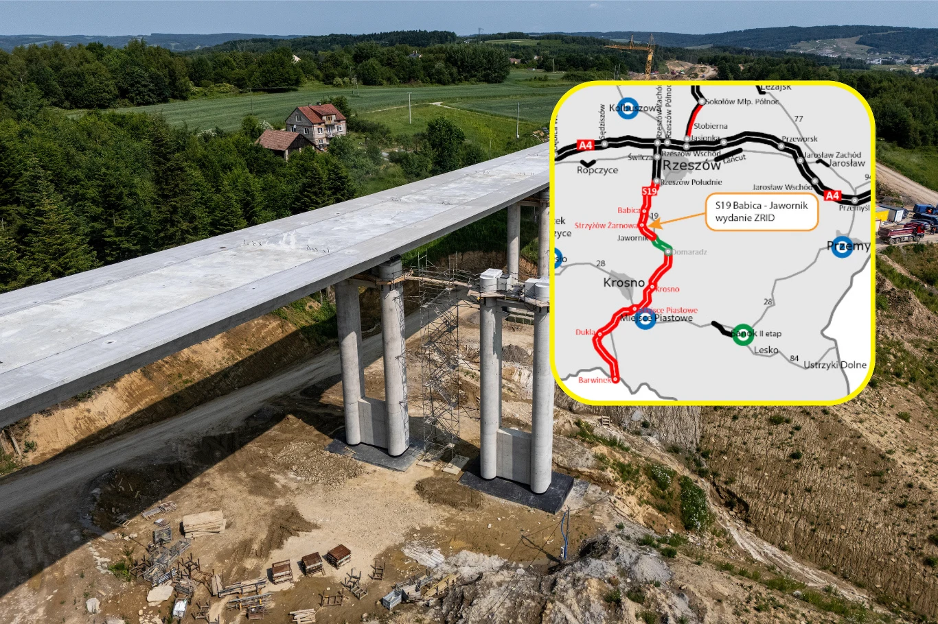 Nowo wybudowany wiadukt drogowy na tle zielonego krajobrazu. W prawym górnym rogu znajduje się mapa z zaznaczoną trasą drogi S19 Babica - Jawornik