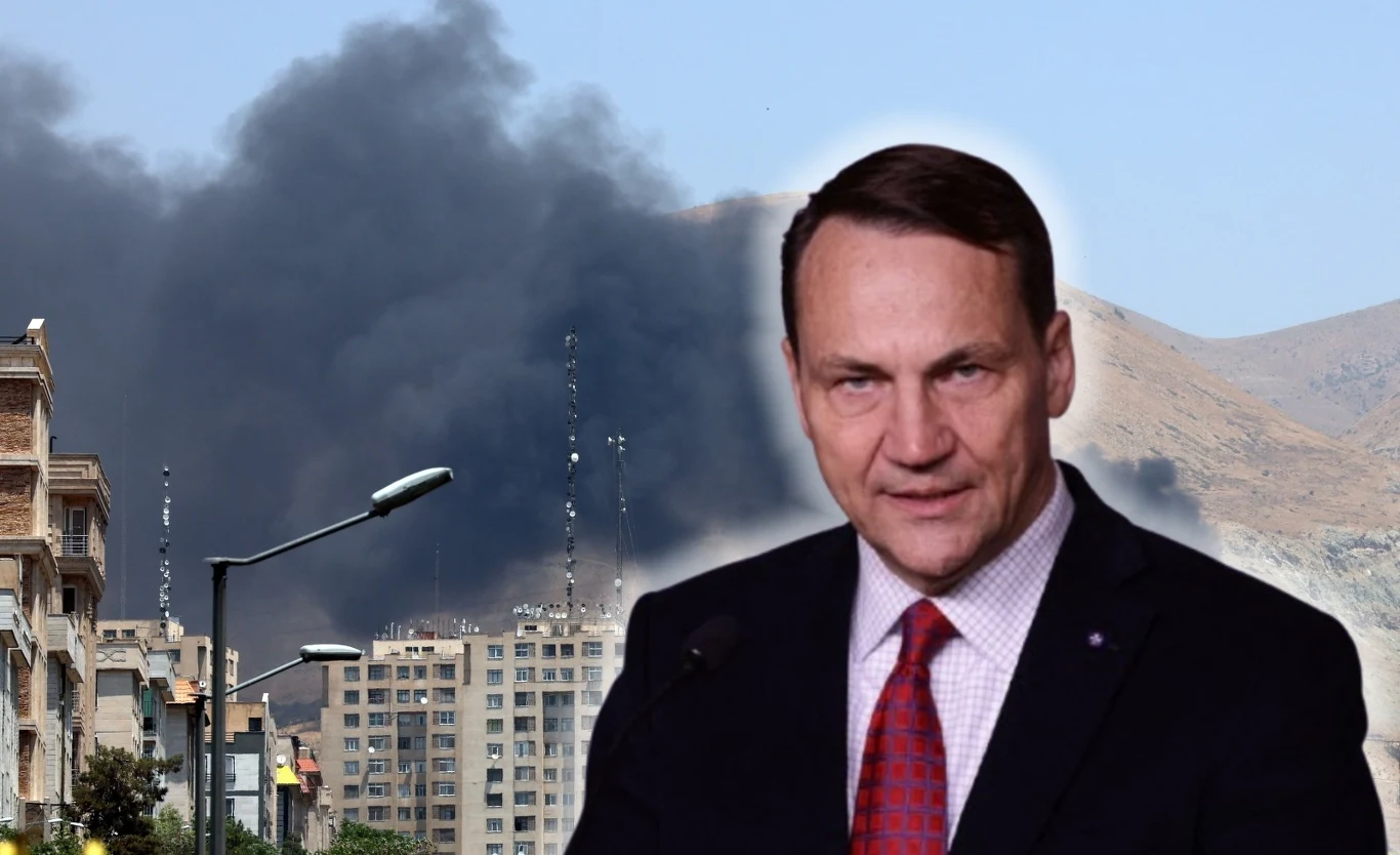 Izrael uderzył w irańską telewizję. Niedaleko znajduje się polska ambasada Mężczyzna w garniturze i czerwonym krawacie na pierwszym planie, za nim panorama miasta z unoszącym się nad budynkami dużym kłębem czarnego dymu na tle gór