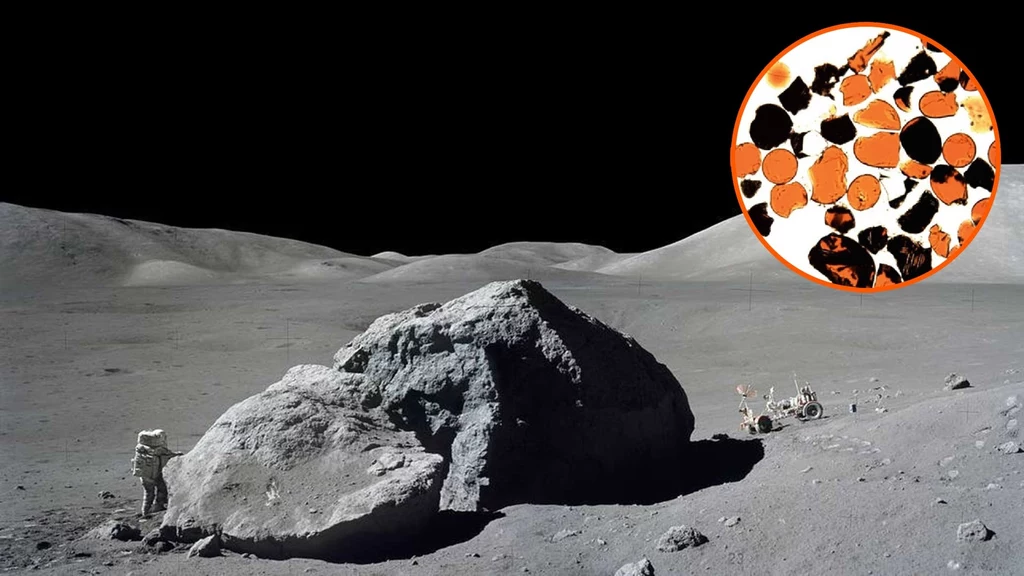 Harrison H. Schmitt w trakcie misji Apollo 17, 13 grudnia 1972 r. Obok próbki księżycowych koralików pod mikroskopem Harrison H. Schmitt w trakcie misji Apollo 17, 13 grudnia 1972 r. Obok próbki księżycowych koralików pod mikroskopem