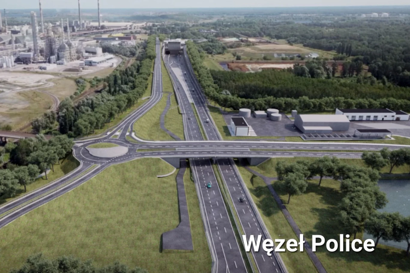 Nowoczesny węzeł drogowy z rozbudowaną infrastrukturą, licznymi pasami ruchu oraz rondem, otoczony zielenią i sąsiadujący z kompleksami przemysłowymi i zabudowaniami wodnymi.