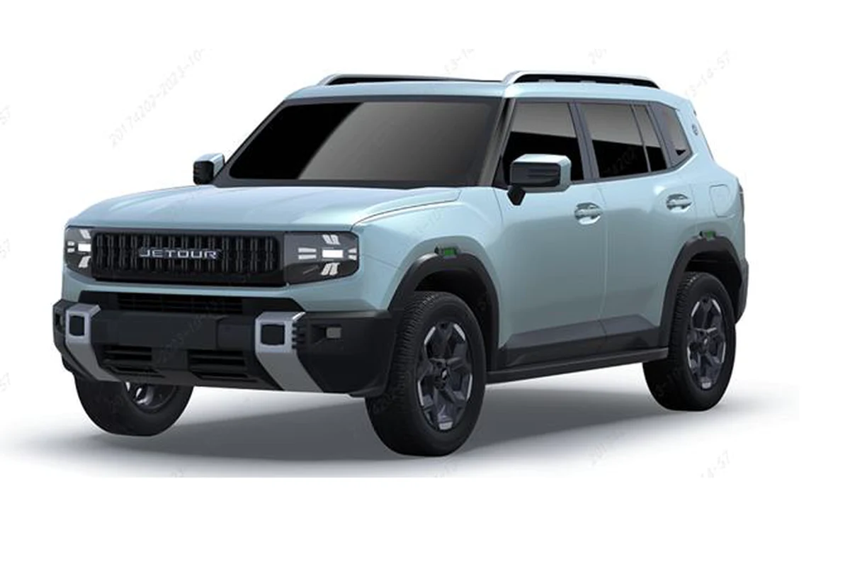 Nowoczesny SUV o jasnoniebieskim kolorze z czarnymi akcentami, masywnym przodem, czarnymi felgami i przyciemnianymi szybami, wyraźnie widoczny emblemat JETOUR na grillu.