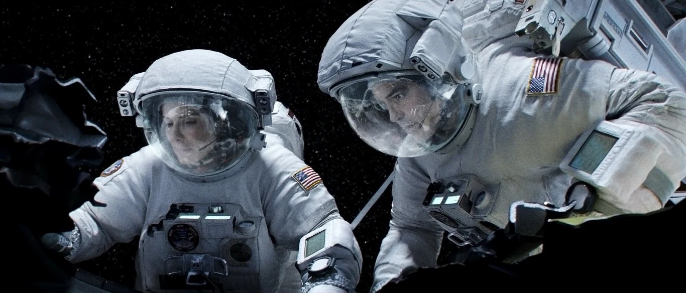 Sandra Bullock i George Clooney w "Grawitacji" Sandra Bullock i George Clooney w "Grawitacji"