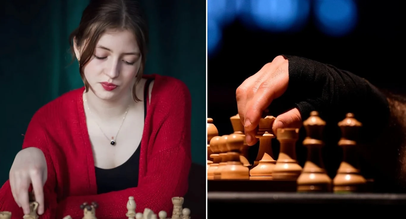 Eline Roebers Młoda kobieta w czerwonym swetrze skupia się podczas gry w szachy, po prawej stronie zbliżenie ręki przesuwającej bierki szachowe na planszy, tło nieostre i ciemne.