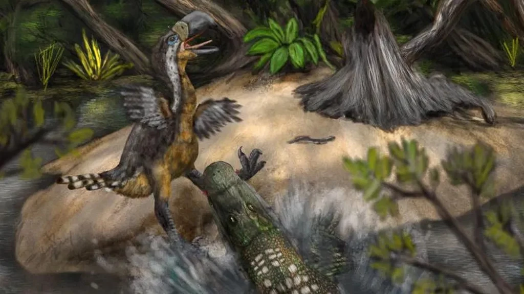 Drapieżny gad wodny wyłania się z wody i atakuje niewielkiego pierzastego dinozaura na piaszczystej wysepce otoczonej bujną roślinnością; w tle widoczne powalone pnie drzew i zielone liście.