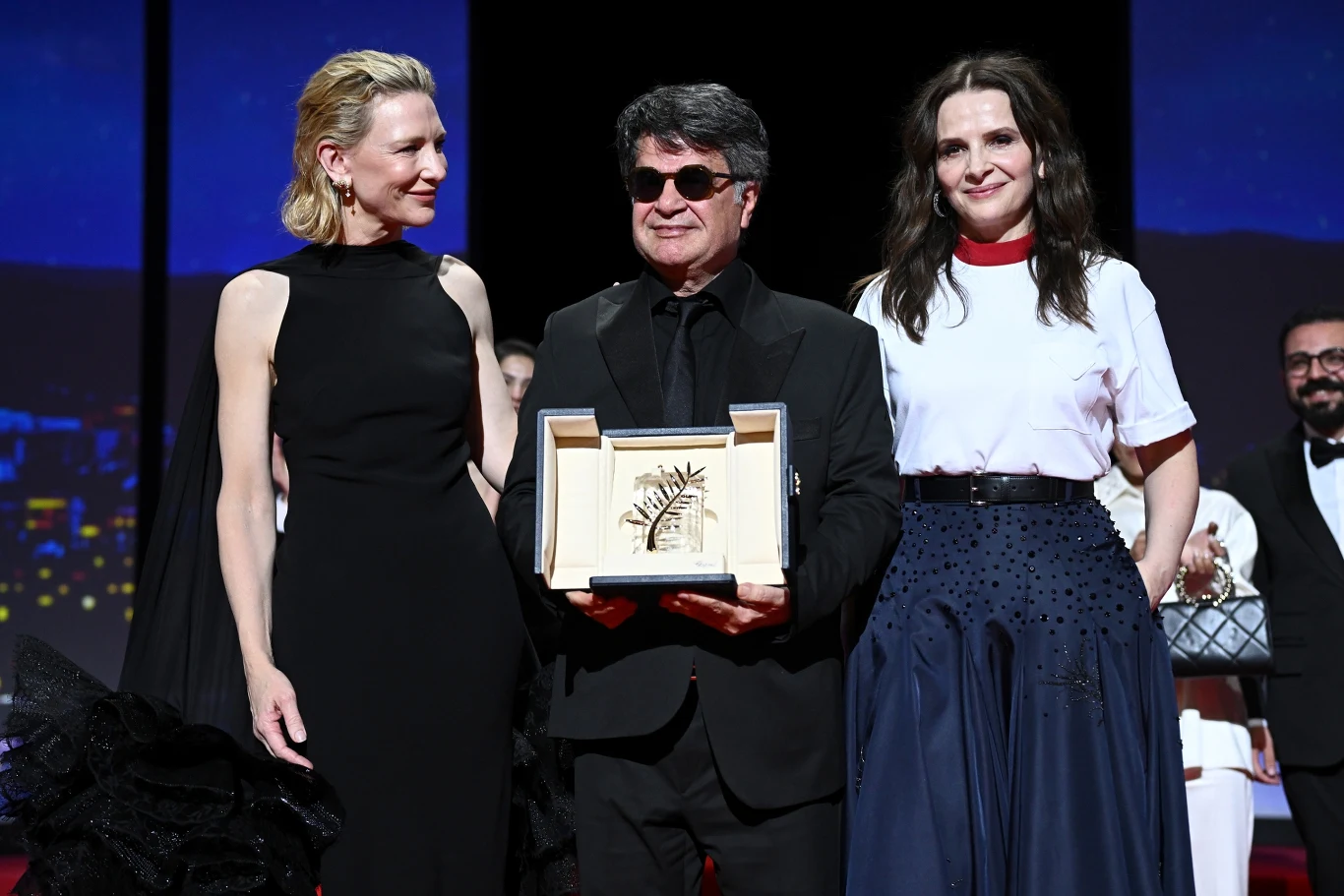 Cate Blanchett, Jafar Panahi i Juliette Binoche podczas festiwalu w Cannes w 2025 roku