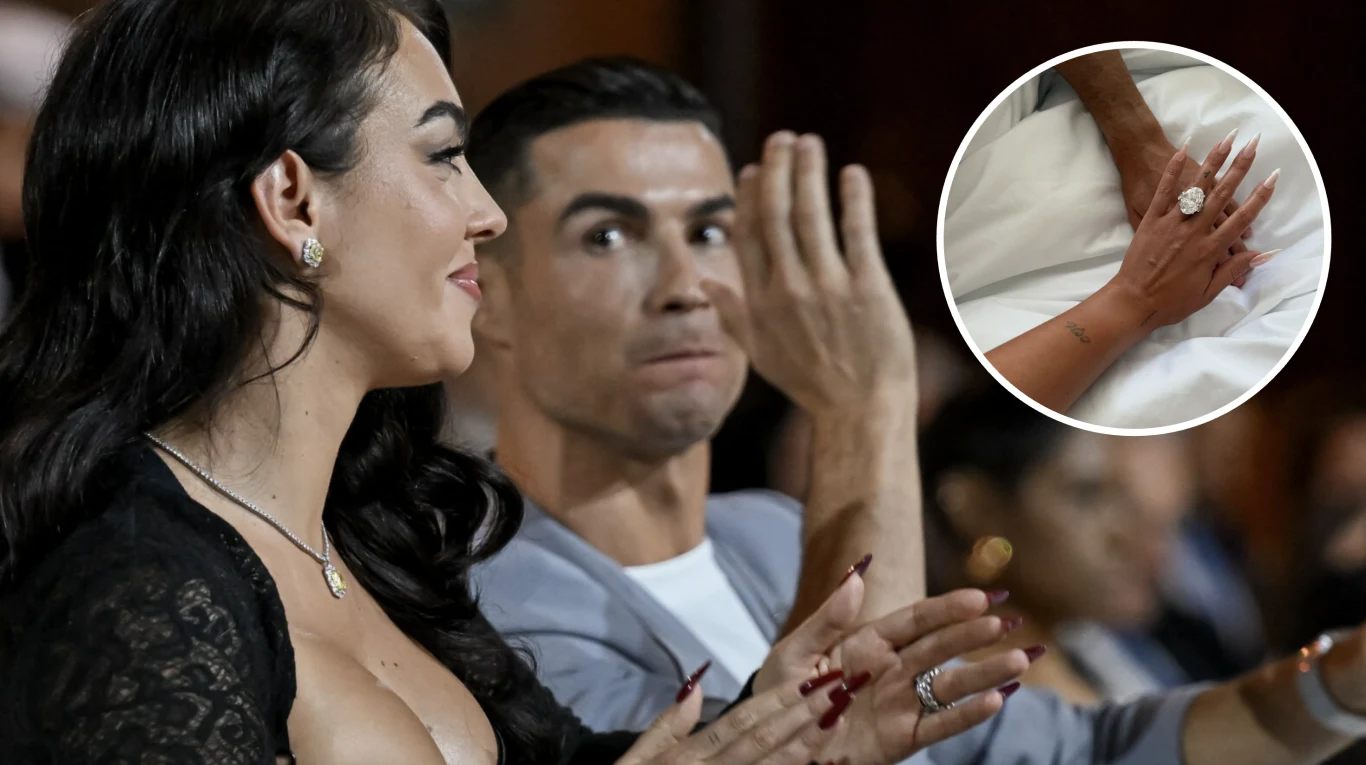Cristiano Ronaldo oświadczył się Georginie Rodriguez Kobieta w eleganckiej czarnej sukni i mężczyzna w jasnej marynarce siedzą obok siebie, patrząc w jednym kierunku i klaszcząc, a na pierwszym planie widoczne są ich dłonie, na których znajdują się okazałe pierścionki; w okrągłym wstawionym kadrze zbliże...