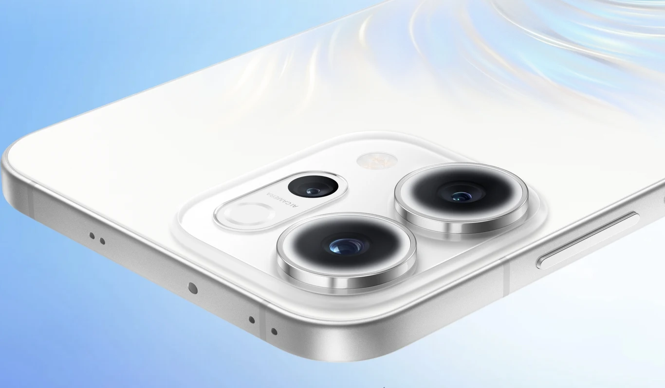 Nowoczesny smartfon w białej obudowie z wyraźnie zaznaczonymi podwójnymi obiektywami aparatu fotograficznego oraz błyszczącą powierzchnią tylnej części urządzenia.