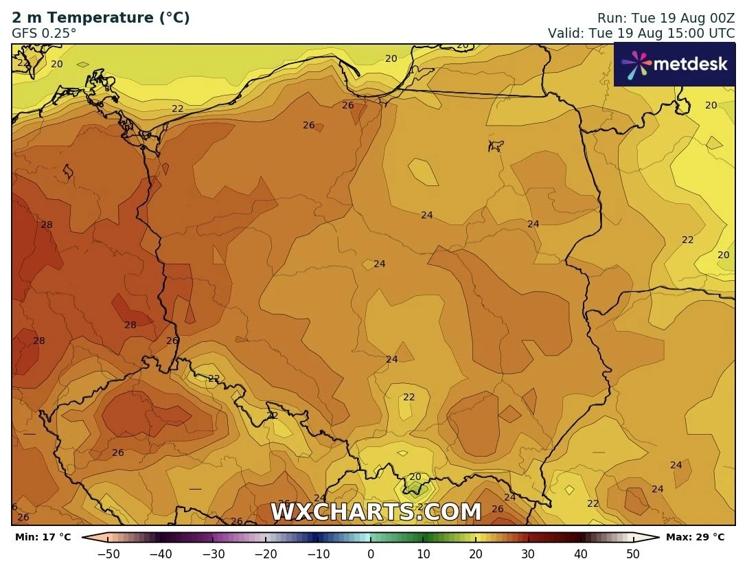 Mapa temperatur powietrza w Polsce i krajach sąsiednich, prezentująca wartości od 17°C do 29°C, z najwyższymi temperaturami w południowo-zachodniej części kraju. Widoczne wyraźne zróżnicowanie termiczne, granice państw są zaznaczone cienkimi liniami.