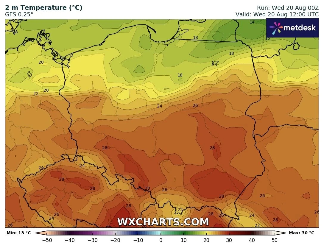 Kolorowa mapa pogodowa Polski przedstawiająca rozkład temperatury powietrza na wysokości 2 metrów, ukazująca wyraźny podział termiczny kraju, gdzie południowe regiony notują wyższe wartości temperatur, a północne niższe.