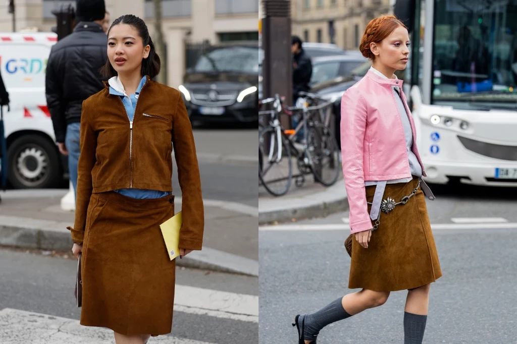 Paris Fashion Week 2025-2026. Fot. Claudio Lavenia, Christian Vierig Dwie kobiety ubrane w brązowe spódnice, jedna z nich ma brązową kurtkę, druga różową kurtkę, stoją na ulicy miejskiej; w tle widoczne są rowery i samochód.