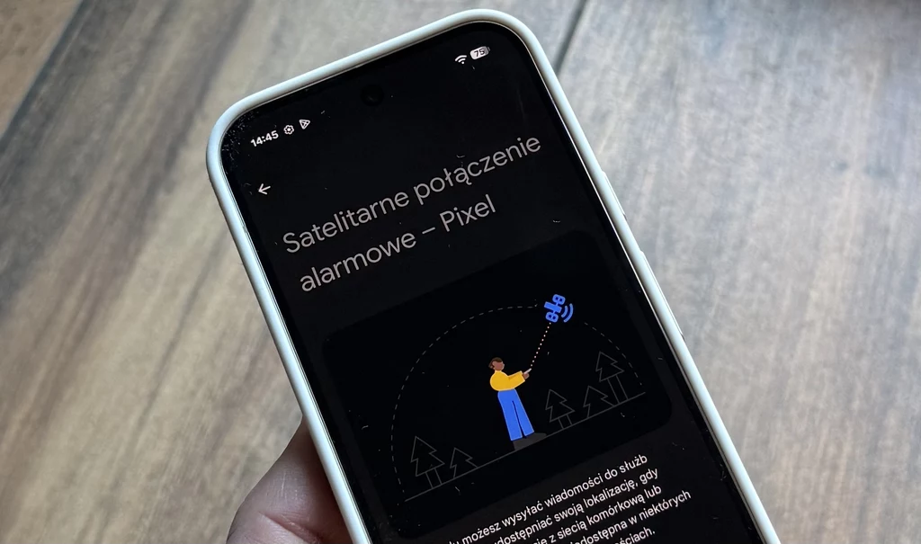 Google Pixel 10 wprowadza łączność satelitarną i funkcja działa również w Polsce. Smartfon z uruchomionym ekranem wyświetlającym instrukcję dotyczącą satelitarnego połączenia alarmowego w urządzeniu Pixel, na ilustracji kolorowa grafika osoby wysyłającej sygnał do satelity na tle drzew.
