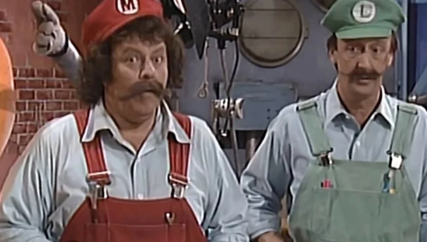 "Przygody braci Mario" to pierwszy serial z popularnego uniwersum Nintendo łączący animacje z live action. W Polsce emitowany był w 1997 r. w telewizji Polsat Dwóch mężczyzn ubranych w charakterystyczne stroje nawiązujące do postaci hydraulików z gier wideo, jeden w czerwonym kombinezonie i czerwonej czapce z literą M, drugi w zielonym kombinezonie i zielonej czapce z literą L, stojących w industrialnym wnęt...
