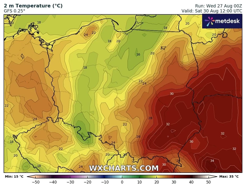 Kolorowa mapa Polski z oznaczeniem prognozowanych temperatur powietrza na różne regiony, najwyższe wartości temperatury występują na wschodzie kraju, stopniowo malejąc w kierunku zachodnim.