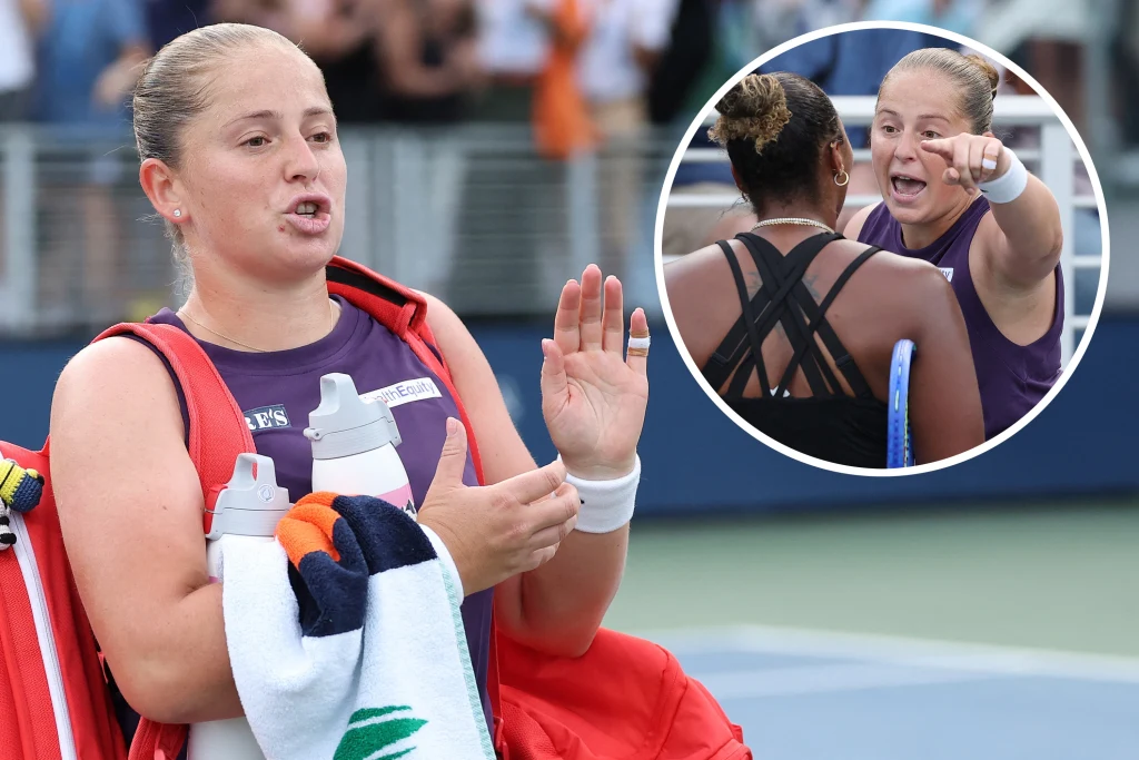 A tennis player in a sports outfit, with a towel and bottles of water on her shoulder, leaves the court after the match, gesturing with her hands; In a round close close, an emotional exchange of sentences with a second player against the background of the court.
