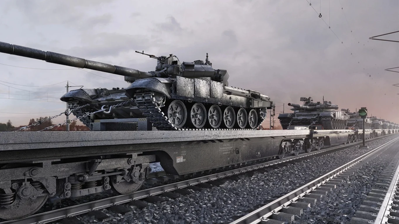 Rosjanie wysłali na front ogromny transport czołgów T-62 Czołgi przewożone na platformach kolejowych zimową porą, szron pokrywający pojazdy, rozciągająca się na horyzoncie linia torów oraz industrialny krajobraz w tle.