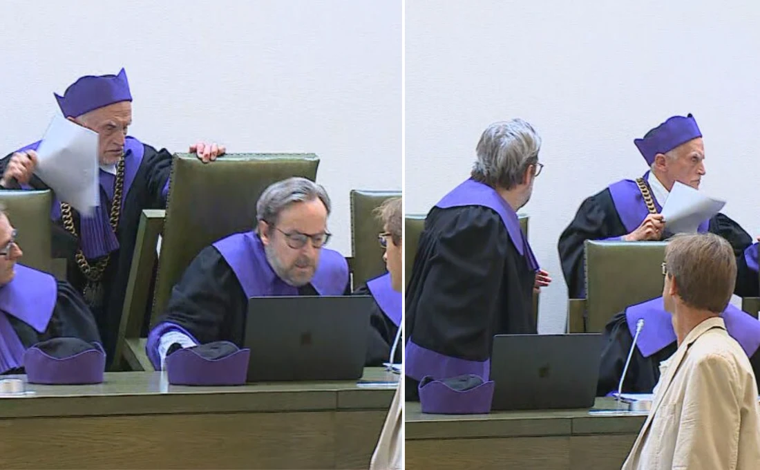 Awantura w Trybunale Stanu Sędziowie ubrani w togi i charakterystyczne nakrycia głowy siedzący przy stole obrad, część z nich pracuje przy laptopach, jeden z sędziów trzyma w dłoni dokument, a inny zwraca się w kierunku kolegi.