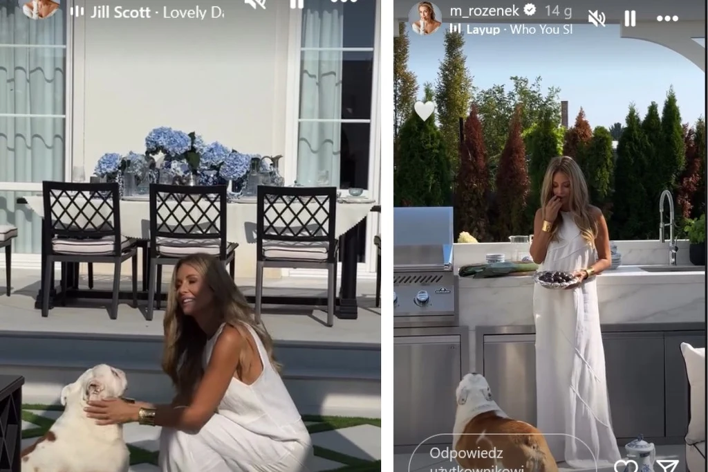 Małgorzata Rozenek pokazała swój taras Kobieta w białym stroju w ogrodzie spędza czas z buldogiem angielskim, na tle eleganckiego tarasu z kwiatami w donicach oraz nowoczesnej kuchni ogrodowej.