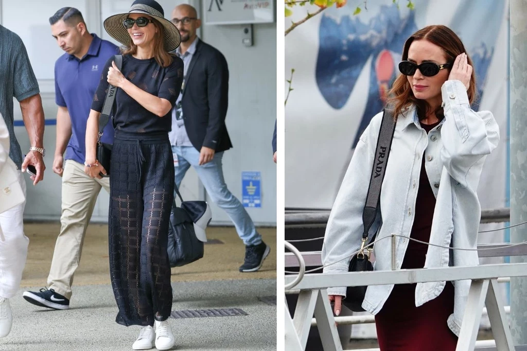 Emily Blunt przybywająca i opuszczająca Wenecję Dwie kobiety noszące modne stylizacje, jedna w kapeluszu, okularach przeciwsłonecznych i transparentnych spodniach, druga w jasnej kurtce jeansowej oraz dużych okularach przeciwsłonecznych, obie z uśmiechem i na luzie.