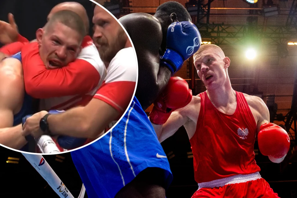 Adam Tutak Dwóch bokserów w ringu podczas intensywnej walki, jeden w czerwonym stroju wyprowadza cios w stronę przeciwnika w niebieskim stroju, scena dynamiczna ze skupieniem na fizycznym kontakcie. W okrągłym zbliżeniu widoczne mocne trzymanie i emocje zawodnika.