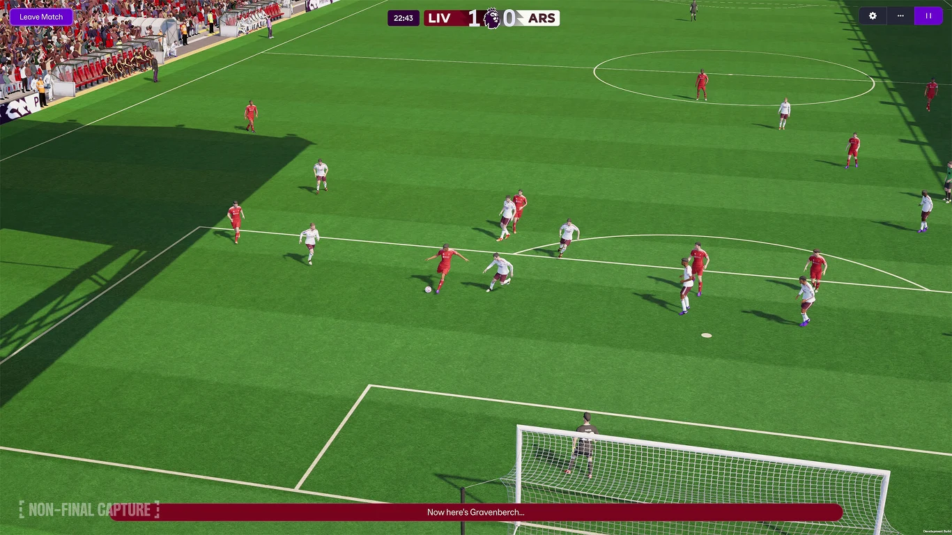 Football Manager 26 Football Manager 26. Zawodnicy w czerwonych i białych strojach podczas akcji pod bramką, piłka w polu karnym.
