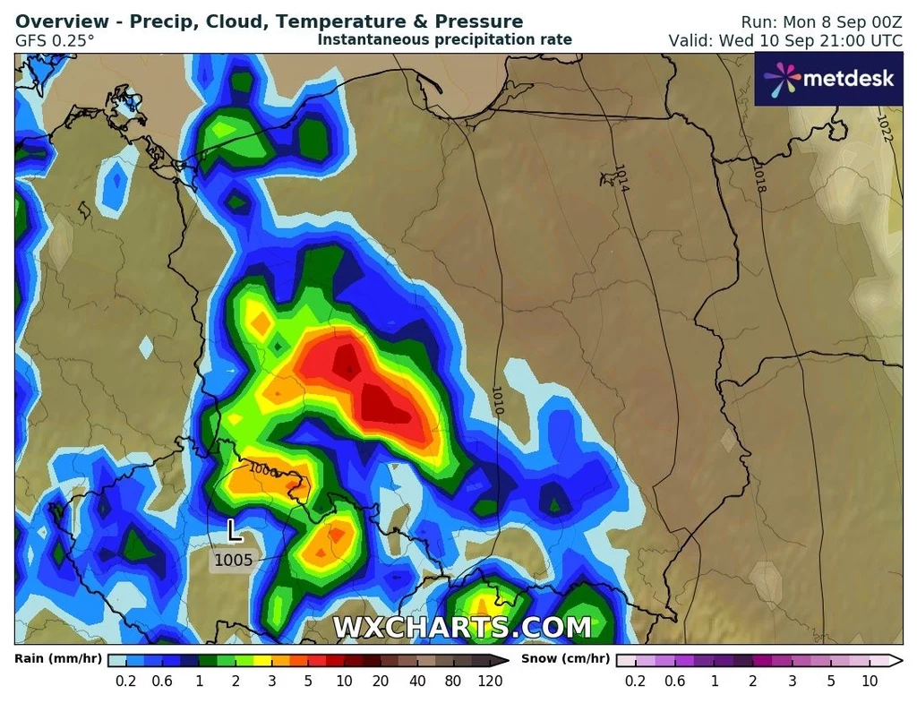 Kolorowa mapa meteorologiczna Europy Zachodniej z zaznaczonymi intensywnymi opadami deszczu, głównie nad północną Francją oraz Beneluksem i Niemcami, przedstawiona w formie graficznej prognozy pogodowej na wskazaną datę.