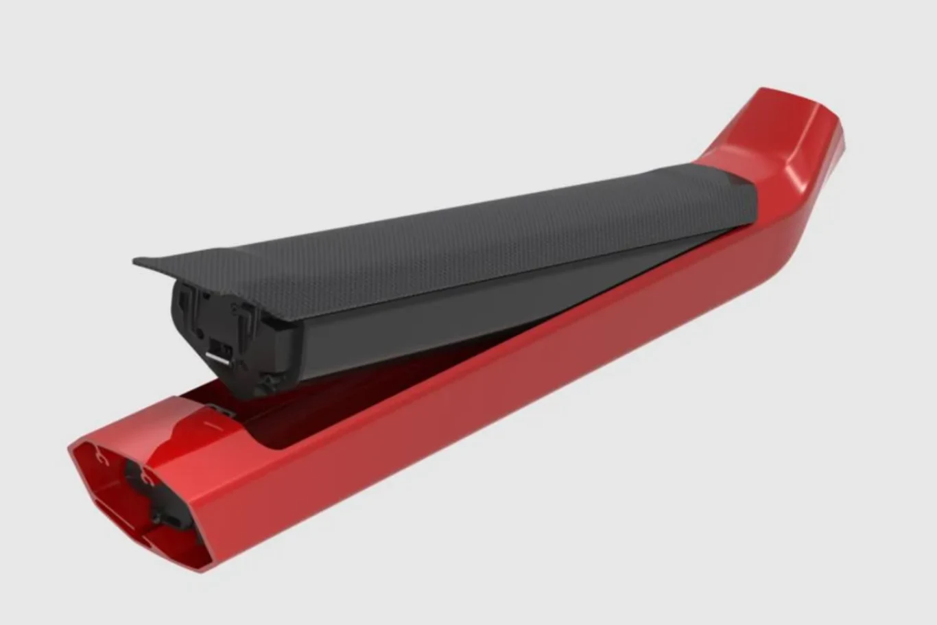Nowoczesna, czerwona obudowa z czarnym, zdejmowanym elementem z tworzywa, przypominająca pokrywę lub osłonę techniczną, najprawdopodobniej fragment baterii lub akcesorium rowerowego.