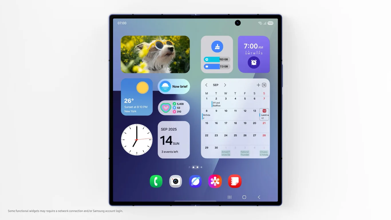 Android 16 i One UI 8 trafią na Samsungi. Producent podał listę urządzeń i ramy czasowe aktualizacji Nowoczesny, składany smartfon z dużym ekranem wyświetlającym pulpity z widgetami, kalendarzem, zegarem, pogodą oraz zdjęciem psa w okularach przeciwsłonecznych, przejrzysty i minimalistyczny design.