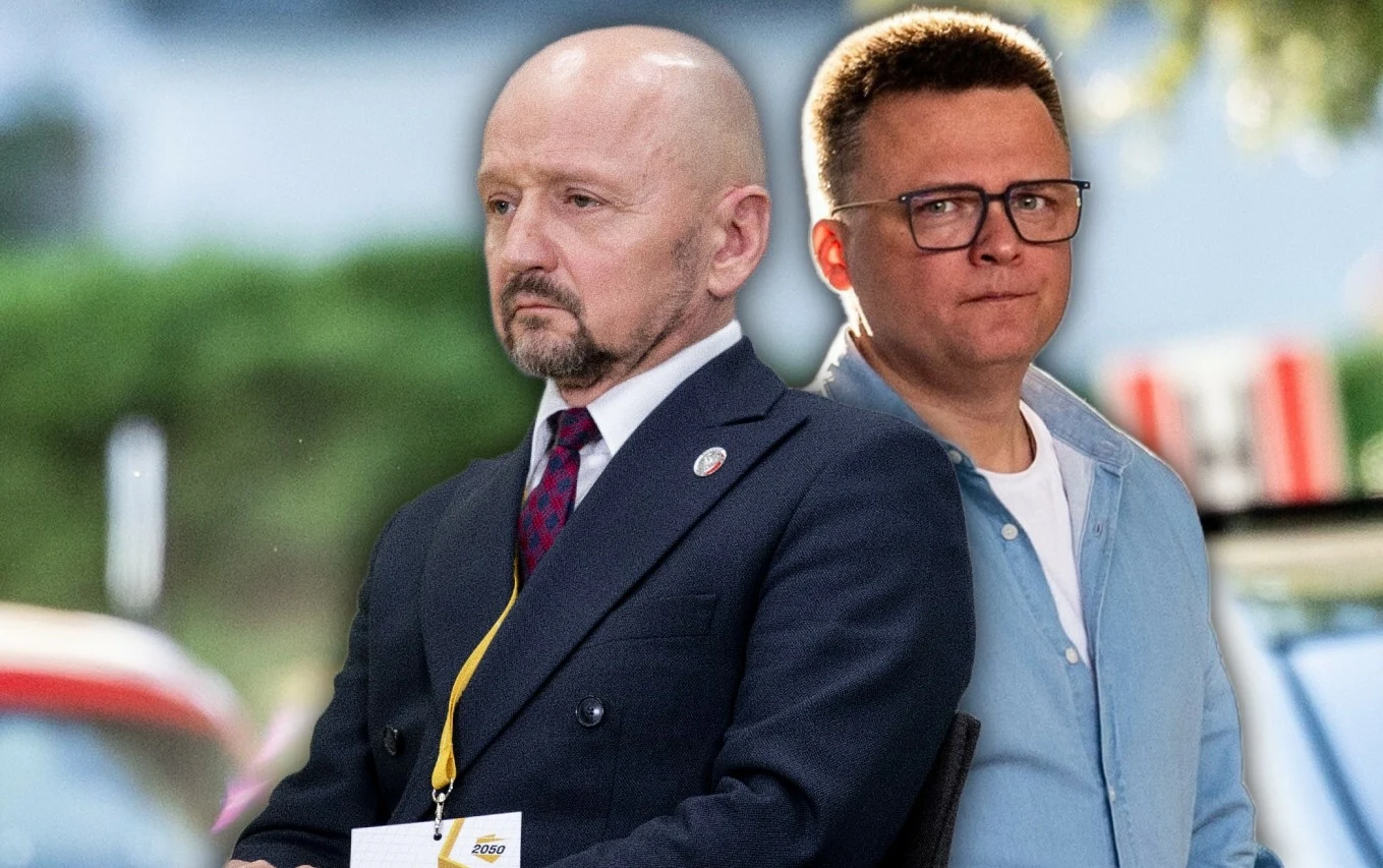 Jacek Bury odchodzi z Polski 2050 Szymona Hołowni. W rozmowie z Interią tłumaczy powody odejścia Dwaj mężczyźni stoją obok siebie, z czego jeden ubrany jest elegancko w garnitur i krawat, a drugi ma na sobie jasną koszulę. W tle widoczne rozmyte elementy otoczenia miejskiego, samochód i zieleń.