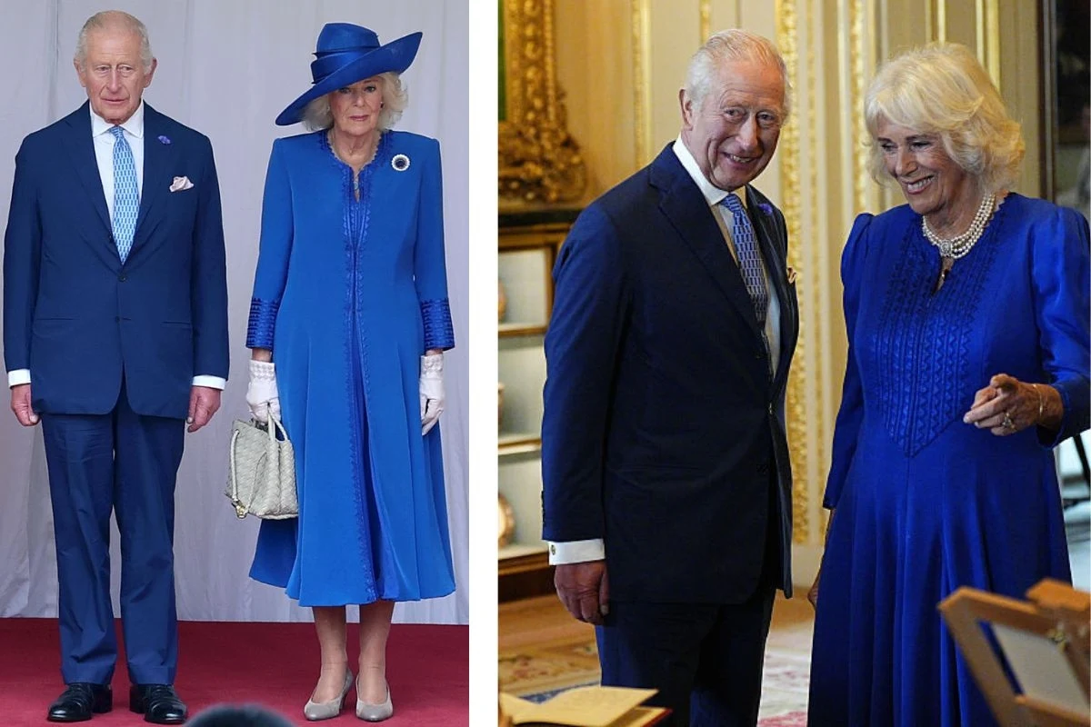 Królowa Kamila postawiła na niebieski kolor Para starszych, elegancko ubranych osób w niebieskich strojach stoi razem na oficjalnym wydarzeniu oraz rozmawia w jasnym, reprezentacyjnym wnętrzu. Kobieta ma na sobie długą suknię, kapelusz i jasną torebkę, mężczyzna ubrany jest w ciemny garnitur i n...
